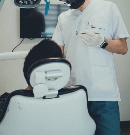 Patient receiving a gentle tooth extraction in Towson MD at Smithberger DDS